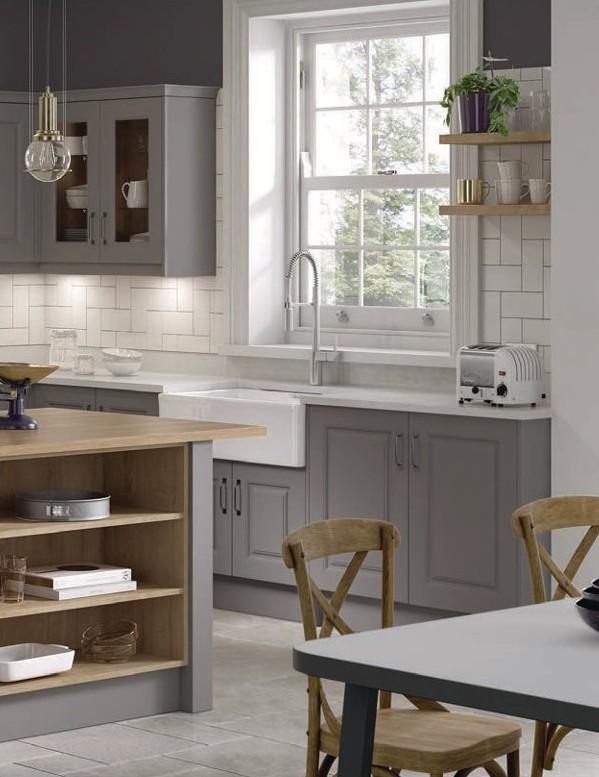 Warm grey shaker style kitchen with wood accents