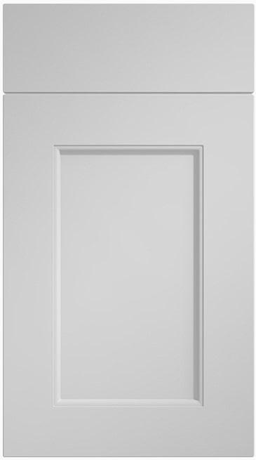 White slab door with integrated handle groove for a sleek finish.
